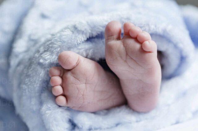 Close up of feet of a newborn baby